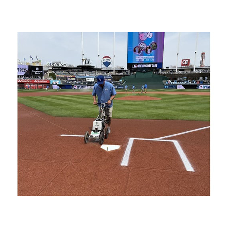 spray baseball softball batters box infield dirt clay with water spray to paint lines over compact dirt