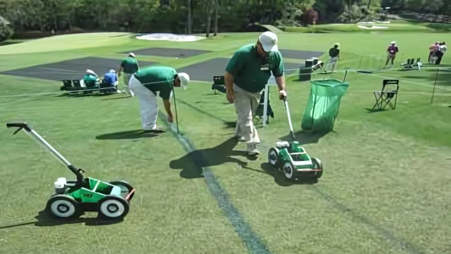  Professionals Using Line Marking Machines On Grass 